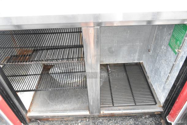 True TBB-2G-S commercial 2-door back bar merchandiser, stainless steel, minor wear, 115 volts, 1 phase.