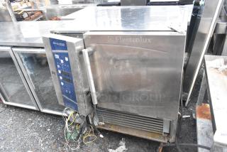 Electrolux Stainless Steel Air-o-chill Blast Chiller, featuring digital controls and visible cables, showing signs of use.