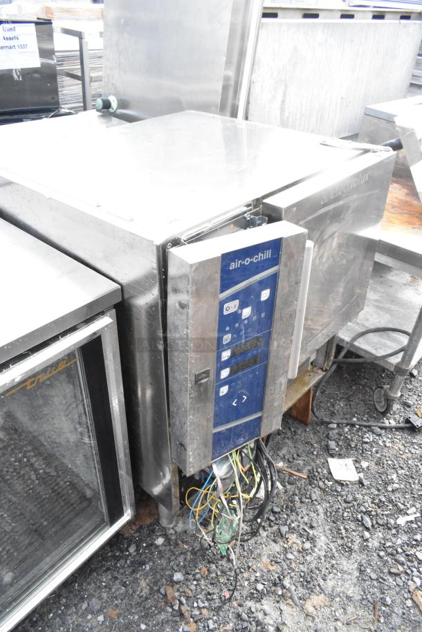 Electrolux Air-o-chill blast chiller, stainless steel, commercial grade, visible control panel, used condition, exposed wiring.