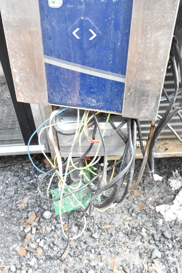 Electrolux stainless steel commercial Air-o-chill blast chiller with visible wiring and moderate exterior wear.