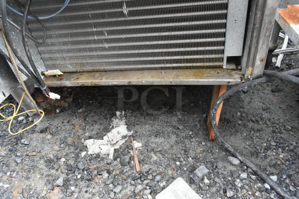 Electrolux Stainless Steel Commercial Air-o-chill Blast Chiller showing exterior condition; wires visible, some rust present.