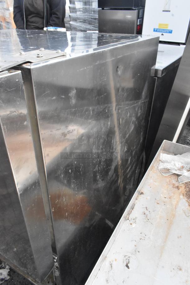 Electrolux stainless steel commercial air-o-chill blast chiller with visible scuffs and wear. Industrial-grade appliance.