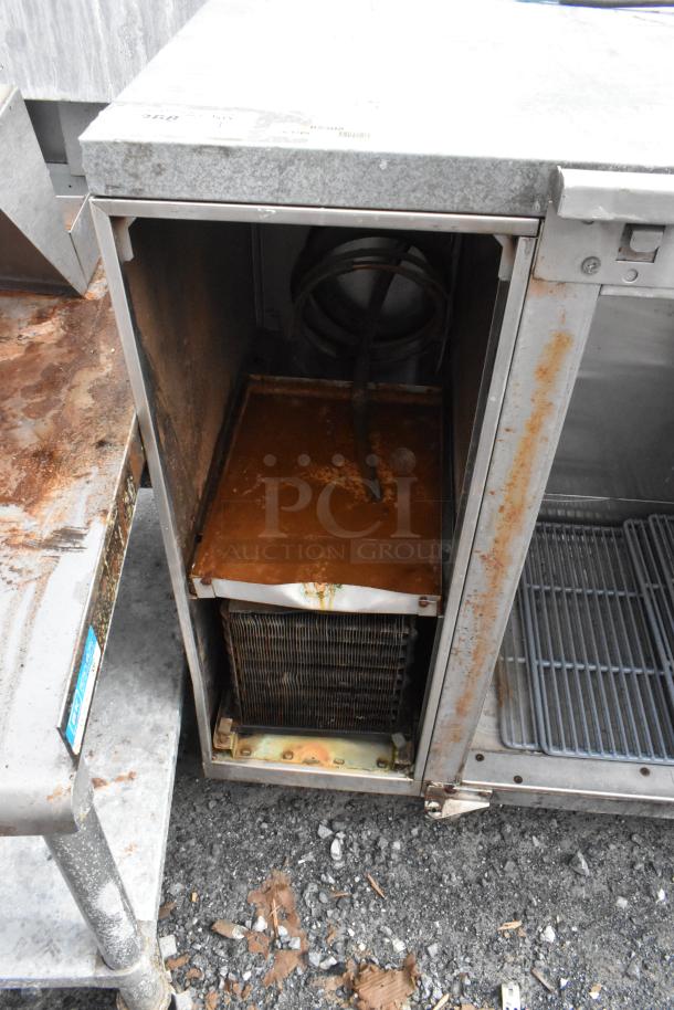 Perlick BS3DS stainless steel commercial 3-door back bar cooler, missing one door. Shows rust and wear. 115V, 1 phase.