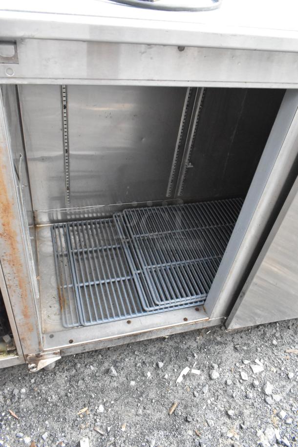 Perlick BS3DS stainless steel 3-door back bar cooler, missing one door, 115V, 1 phase. Visible wear and rust.