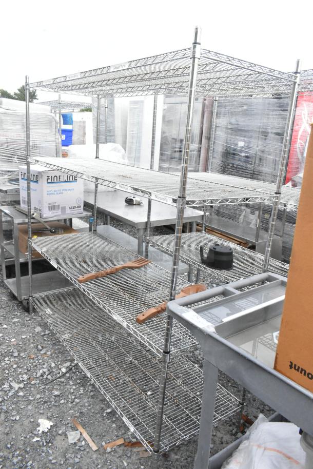 Chrome finish 4-tier wire shelving unit in used condition. Buyer must dismantle. Consider freight charges for shipping.