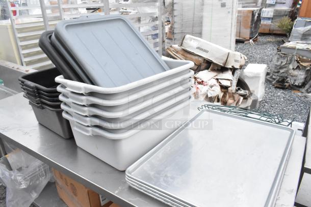Regency 600TS3072S stainless steel table with under shelf; includes poly bus bins. Visible boxes and wire racks.