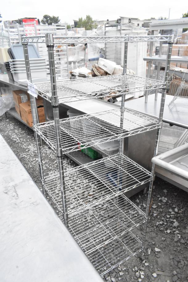 Chrome finish 6-tier wire shelving unit, sturdy, excellent condition, for dismantling by buyer, consider freight charges.