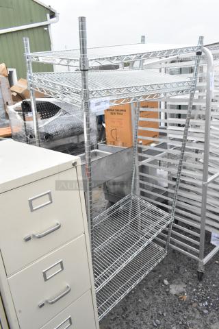 Chrome finish 4-tier wire shelving unit. Excellent condition, needs dismantling. Consider freight for shipping.