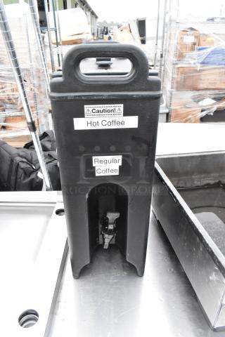 Cambro black poly beverage dispenser, labeled "Hot Coffee" and "Regular Coffee," with spout. Good condition.