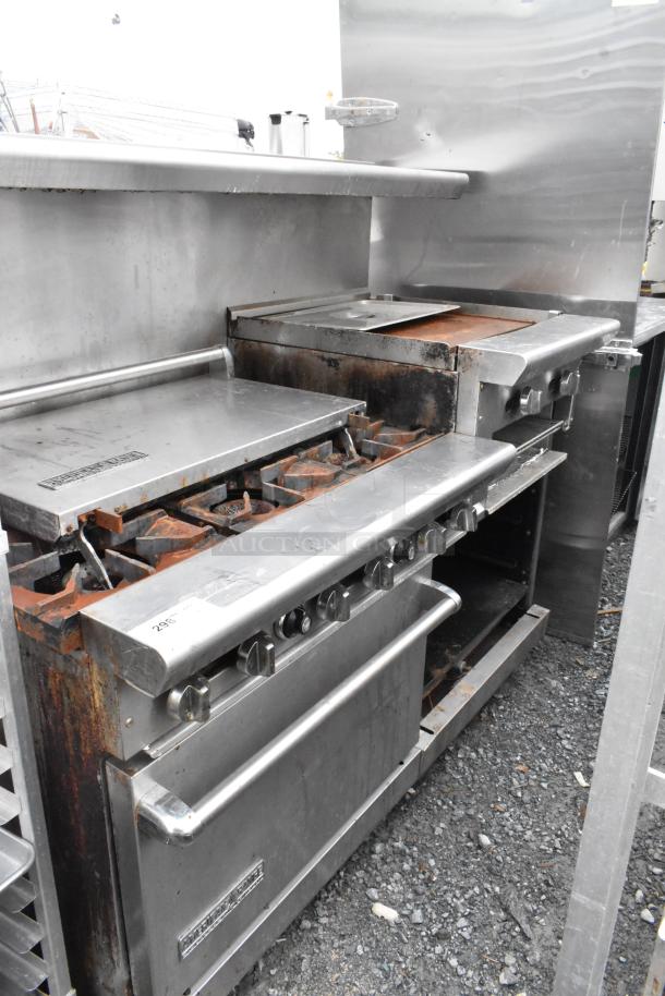 American Range stainless steel 6-burner gas range with right side griddle, 2 ovens, overshelf, and backsplash. Commercial use.