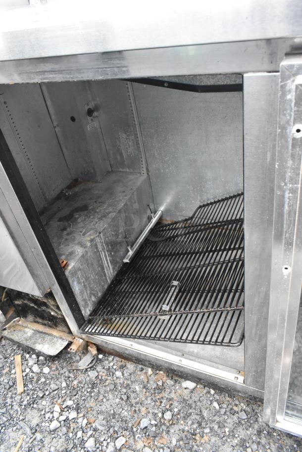 True TBB-2G-S stainless steel back bar cooler merchandiser, missing door. 115V, 1 phase, commercial use.