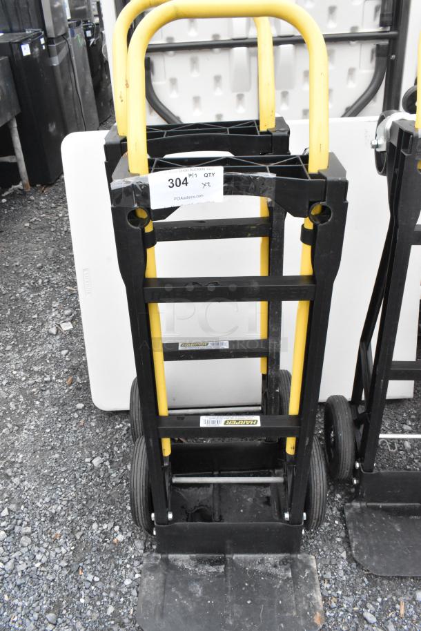 2 Harper PJDV2223A furniture dollies with yellow handles and black frames; label indicates "304" lot number.