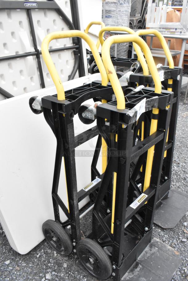 Two Harper PJDV2223A furniture dollies with yellow handles and black frames, showing signs of light use.