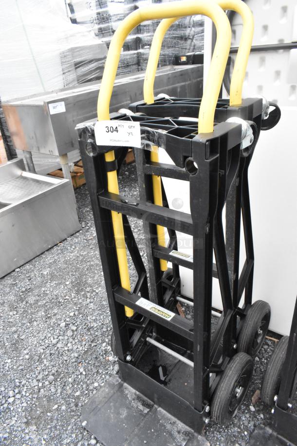 Two Harper PJDV2223A furniture dollies, black with yellow handles, four wheels each, excellent condition, auction tag visible.