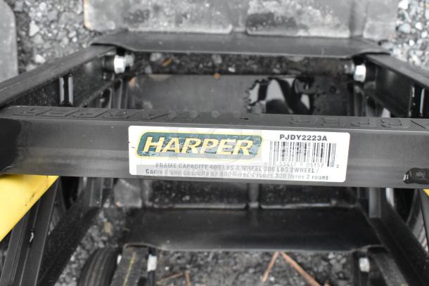 2 Harper PJDV2223A furniture dolly with frame capacity of 400 lbs 4-wheel, 300 lbs 2-wheel. Includes label detail.
