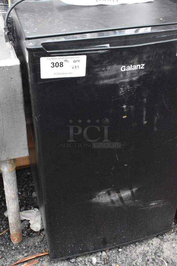 Three mini coolers, including Galanz GL35BK-GL35S5, GLR25MBKE02, and Vissani HVDR45Ps. 120 Volts, 1 Phase. Black finish. Scratches visible.