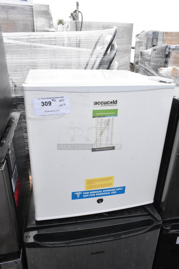 Four mini coolers including Accucold Freezer, Galanz GL43S5, Midea WHS-65LB1, GE WMR04GAVBBB. 120V, 1 Phase. Auction Item.