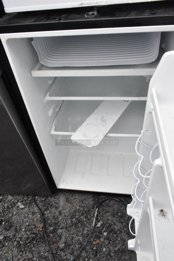 Four mini coolers open with shelves visible, includes Accucold, Galanz GL43S5, Midea WHS-65LB1, GE WMR04GAVBBB. 120V, 1 Phase.