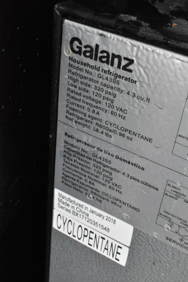 Label on Galanz GL43S5 mini cooler showing specs: 4.3 cu. ft., 120 VAC, uses R600a refrigerant. Made in January 2018.