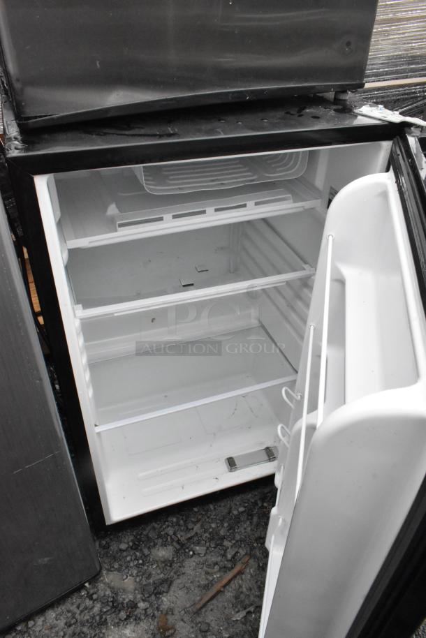 Four mini coolers including Accucold freezer, Galanz GL43S5, Midea WHS-65LB1, GE WMR04GAVBBB, 120V, 1 phase, open doors.