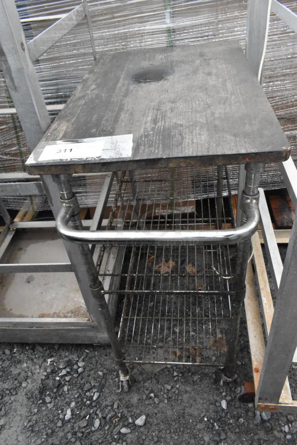 3-tier cart with commercial casters, metal frame, wire shelves, worn wooden top, visible tag with number "311."