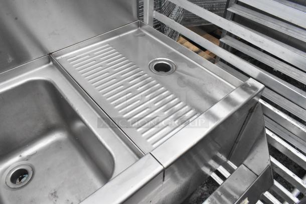 Perlick stainless steel 3 bay back bar sink featuring dual drain boards, Speedwell faucet, and handles in used condition.