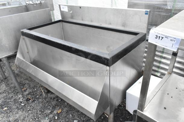 Stainless steel ice bin with speedwell, no legs, durable construction, used condition, auction tag number 317 visible.