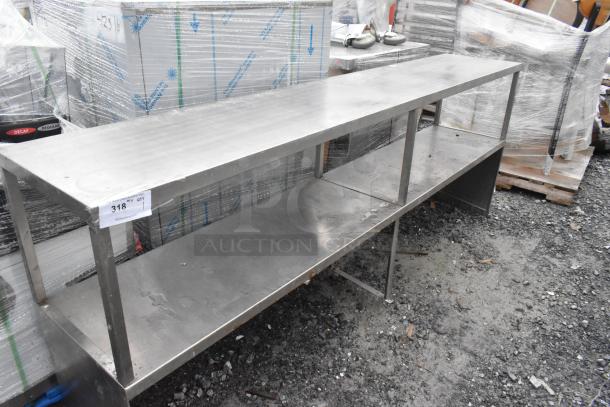 Stainless Steel 2 Tier Over Shelf, industrial-grade, used condition, durable storage solution for kitchens or workshops.