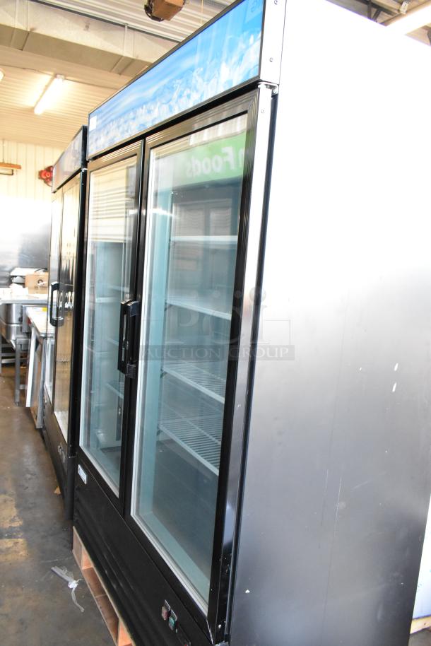 Brand new Avantco 178GDC49FHCB glass door freezer, 53" black, customizable, with LED lighting, minor scratches, 115V.
