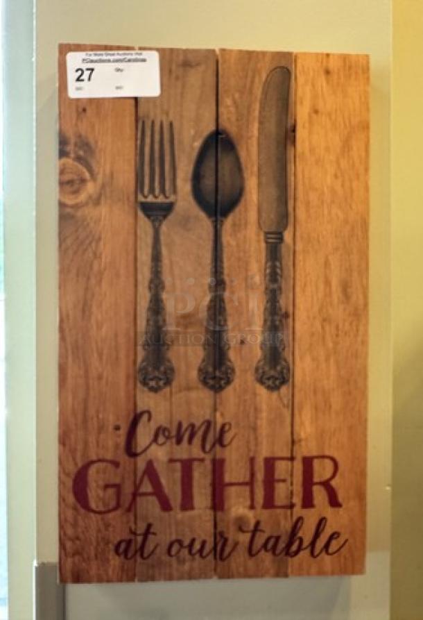 Wooden decorative picture with utensil motifs and "Come Gather at Our Table" text, wooden plank design, good condition.