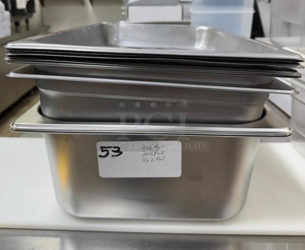 Stack of stainless steel pans, including four 2-inch and two 6-inch full-size pans. Label shows item number 53 with contents.