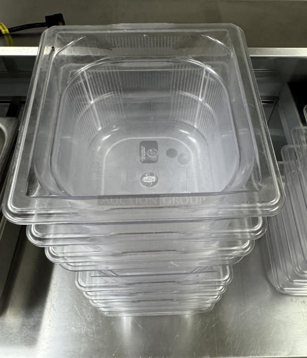 Vollrath acrylic containers, 1/6 x 4, stack of 9, clear, excellent condition, smooth interior, stored on stainless steel.