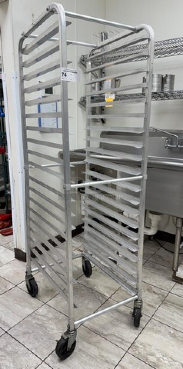 Aluminum sheet pan rack with multiple slots, four caster wheels, and a label marked "24." Ideal for commercial kitchens.