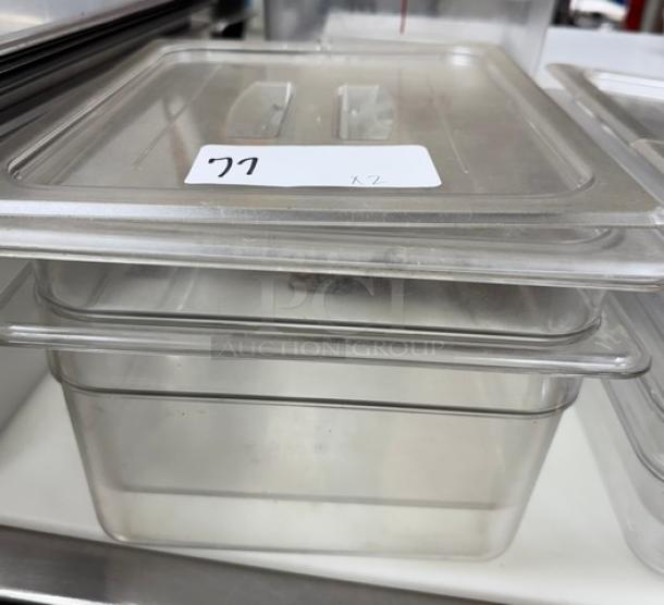 Cambro plastic containers with lids, stackable, clear, set of two. Label indicates "77 x2". Excellent condition.