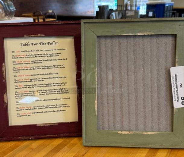 Decorative 8x10 picture frames; one burgundy with text, one green, both with distressed edges. Price tag visible.