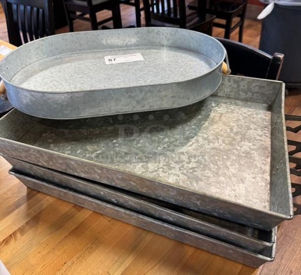 Oval and rectangular tin trays for display, set of four, metallic finish, excellent condition, tag marked "B7".