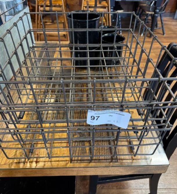 Metal wire storage/display containers, set of 2, in rustic condition. Tag reads "97, qty. x 2." Ideal for decor or storage.
