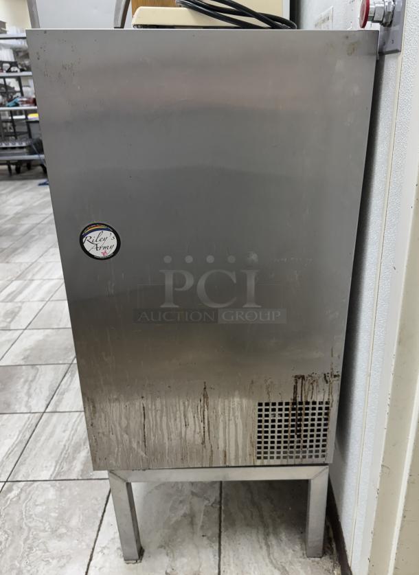 True Refrigerated Display Case, Model TSD-09G-LD, stainless steel, tested and working, visible wear and marks, "Riley's Army" sticker.