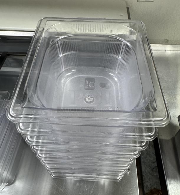 Vollrath acrylic 1/6 pans stack, clear, new condition, 9 pieces, visible labels indicate dishwasher and food safe.