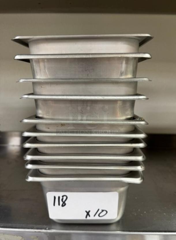 Stack of 10 stainless steel 1/6 x 4 pans, labeled "118 x10," in good condition, ideal for kitchen use.