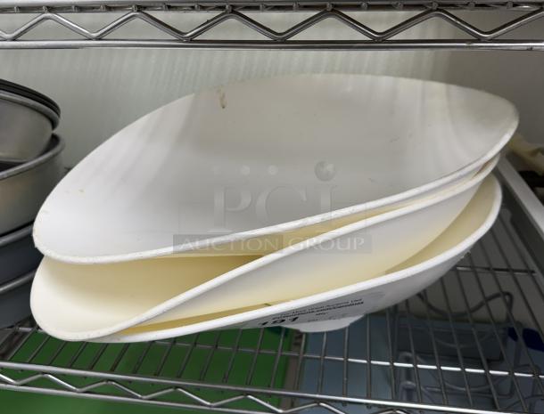 Three Edlund scale containers stacked, white plastic, used condition, minor stains visible, auction label attached.