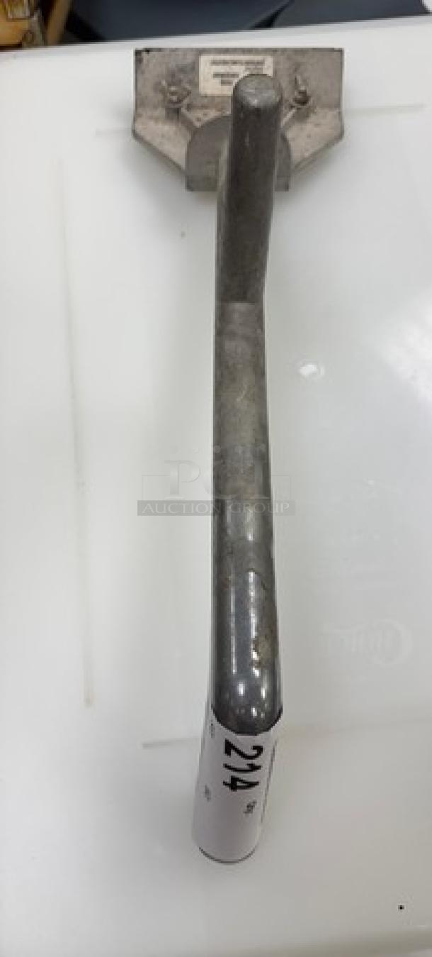 Metal grill scraper with a long handle, used for cleaning grills. Visible tag marked "224" for auction identification.