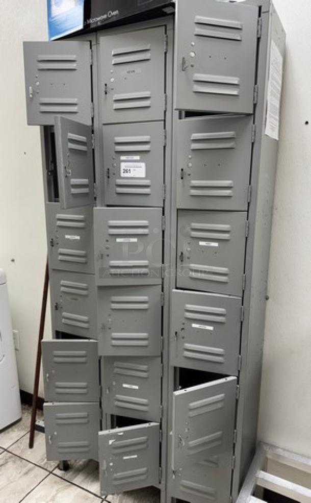 Gray metal 18-cubbie employee locker. Features vented doors with individual locks. Some doors open, used condition.