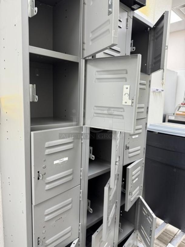 18 Cubbie Employee Locker, gray metal, multiple doors open, shows shelves, minor wear, ideal for organization.
