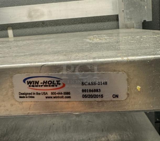 Winholt metal rack with 4 shelves, model SCASS-2148. Features label detailing design in USA, date 05/20/2015.