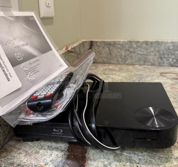 Samsung Blu-ray Disc Player with remote and manual; tested and working condition. Featuring sleek design and complete accessories.