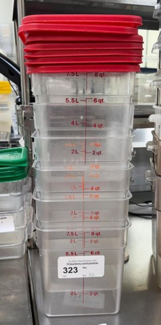 Six 8 Qt. square containers with seven red lids, stacked. Markings indicate quart and liter measurements. Excellent condition.