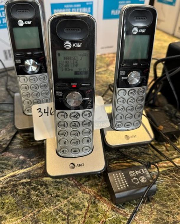 AT&T cordless telephones with bases, set of 3; features include digital display, keypads; good condition, includes chargers.