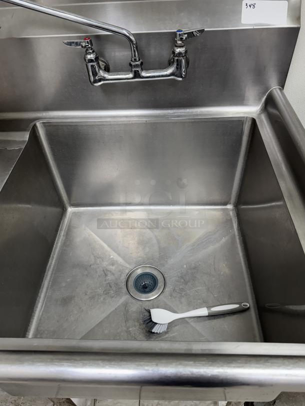 Allstrong 1 Compartment Sink with left drainboard and faucet. Stainless steel, good condition, includes dish brush.