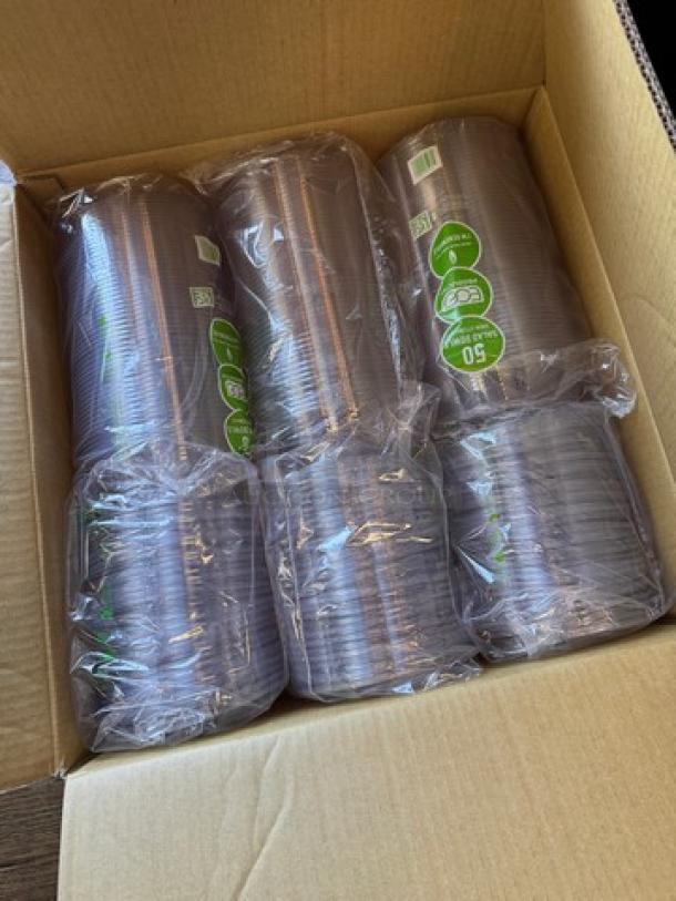 New 32 oz plastic bowls with lids, packed in a box. Includes 3 sets. Sealed in clear plastic with labels indicating quantity.